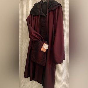 Mycra PAC reversible rain coat with hood. Comes with matching bag.